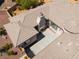 Aerial view of a home's backyard featuring a covered patio area, offering an inviting space for outdoor relaxation at 8536 Grand Palms Cir, Las Vegas, NV 89131