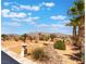 Spacious backyard with desert landscaping, gravel and mountain views at 8536 Grand Palms Cir, Las Vegas, NV 89131