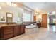 A large bathroom showcases dual vanities, a soaking tub, and luxurious countertops at 8536 Grand Palms Cir, Las Vegas, NV 89131