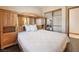 Well-lit bedroom showcases hardwood floors and mirrored closet doors at 8536 Grand Palms Cir, Las Vegas, NV 89131