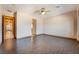 A large, open bedroom features wood-look flooring and neutral paint, providing a serene living space at 8536 Grand Palms Cir, Las Vegas, NV 89131