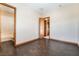 Spacious bedroom with hardwood floors and bathroom access at 8536 Grand Palms Cir, Las Vegas, NV 89131