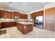 Modern kitchen equipped with stainless steel appliances, ample counter space, and a kitchen island at 8536 Grand Palms Cir, Las Vegas, NV 89131