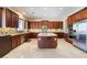 Modern kitchen equipped with stainless steel appliances, ample counter space, and a kitchen island at 8536 Grand Palms Cir, Las Vegas, NV 89131