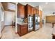 This kitchen boasts stainless steel appliances, including double ovens and a refrigerator at 8536 Grand Palms Cir, Las Vegas, NV 89131
