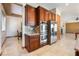 This kitchen boasts stainless steel appliances, including double ovens and a refrigerator at 8536 Grand Palms Cir, Las Vegas, NV 89131
