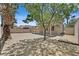 Large, private backyard with covered patio and mature trees offers shade and tranquility at 8904 Meisenheimer Ave, Las Vegas, NV 89143