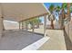 Large backyard with covered patio and low-maintenance desert landscaping at 8904 Meisenheimer Ave, Las Vegas, NV 89143