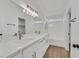 Stylish bathroom with double sink vanity, quartz countertop, modern fixtures, and bathtub at 8904 Meisenheimer Ave, Las Vegas, NV 89143