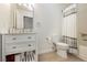 Bright bathroom featuring a toilet, shower, and stylish vanity at 10010 Aspen Rose St # 102, Las Vegas, NV 89183