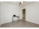 Unfurnished bedroom with laminate flooring, suitable for a home office setup at 10010 Aspen Rose St # 102, Las Vegas, NV 89183