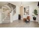 Cozy reading nook next to modern staircase with gray carpet steps at 10010 Aspen Rose St # 102, Las Vegas, NV 89183