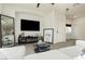 Comfortable living room with large television and decorative fireplace at 10010 Aspen Rose St # 102, Las Vegas, NV 89183