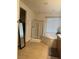 Bright bathroom featuring glass shower, soaking tub and double vanity on tile flooring at 109 Delighted Ave, North Las Vegas, NV 89031