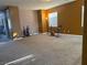Spacious bonus room with carpet flooring, exercise equipment and natural light at 109 Delighted Ave, North Las Vegas, NV 89031