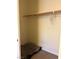 Interior view of a walk-in closet with carpet flooring and single clothing rod at 109 Delighted Ave, North Las Vegas, NV 89031