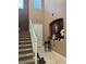 Entryway with stairway, accent wall, and arched niche for displaying decor at 109 Delighted Ave, North Las Vegas, NV 89031