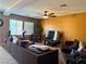 Living room featuring neutral paint and large windows for ample natural light at 109 Delighted Ave, North Las Vegas, NV 89031