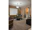 Cozy living room with window, desk, and decorative lighting at 109 Delighted Ave, North Las Vegas, NV 89031