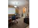 Cozy living room with window, desk, and decorative lighting at 109 Delighted Ave, North Las Vegas, NV 89031