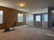 Loft area with multiple windows and a workout bike at 109 Delighted Ave, North Las Vegas, NV 89031
