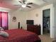 Main bedroom with ceiling fan, closet, and en suite bathroom at 109 Delighted Ave, North Las Vegas, NV 89031
