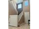 Staircase with neutral tile and carpet steps at 109 Delighted Ave, North Las Vegas, NV 89031
