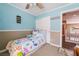 Cozy bedroom with pastel walls, sea-themed bedding, and ample natural light at 11285 Fiesole St, Las Vegas, NV 89141