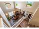 Elevated foyer view showcasing hardwood floors, formal dining, and natural light at 11285 Fiesole St, Las Vegas, NV 89141