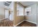 Bright hallway features wood floors, an open wall looking into a room, and fresh neutral paint at 11285 Fiesole St, Las Vegas, NV 89141