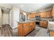 Well-equipped kitchen with stainless steel appliances and a large island perfect for entertaining at 11285 Fiesole St, Las Vegas, NV 89141