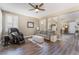 Comfortable living room with hardwood floors, recessed lighting, and comfortable seating at 11285 Fiesole St, Las Vegas, NV 89141
