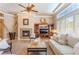 Inviting living room features a fireplace, built-ins, shutters, and neutral color palette at 11405 Perugino Dr, Las Vegas, NV 89138