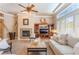 Inviting living room features a fireplace, built-ins, shutters, and neutral color palette at 11405 Perugino Dr, Las Vegas, NV 89138