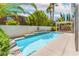 Beautiful pool area with a water feature, a covered patio, and plenty of privacy at 11405 Perugino Dr, Las Vegas, NV 89138