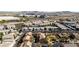 Picturesque aerial view of modern community featuring diverse architectural styles, landscaping, and ample parking at 1185 Via Dimartini, Henderson, NV 89052