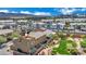 Aerial view of the neighborhood, home, and grassy green common area at 1185 Via Dimartini, Henderson, NV 89052