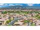 Aerial view of property and neighborhood with mountains and city skyline backdrop at 1185 Via Dimartini, Henderson, NV 89052