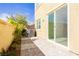 Backyard space features a brick patio and a view of the home's exterior at 1185 Via Dimartini, Henderson, NV 89052