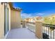 Outdoor balcony with decorative metal railing and neighborhood views at 1185 Via Dimartini, Henderson, NV 89052