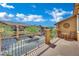 Private balcony offers neighborhood views, complete with seating and a decorative outdoor art piece at 1185 Via Dimartini, Henderson, NV 89052