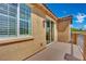 The balcony features a sliding glass door, offering sunlight and fresh air into the house at 1185 Via Dimartini, Henderson, NV 89052