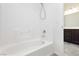 Clean bathroom with bathtub and shower combination, offering a relaxing space at 1185 Via Dimartini, Henderson, NV 89052