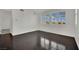 Bright bedroom with plantation shutters and dark wood floors at 1185 Via Dimartini, Henderson, NV 89052