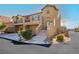 Charming two-story home with a two-car garage, a small balcony and well-kept landscaping at 1185 Via Dimartini, Henderson, NV 89052