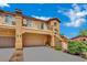 Well-maintained two-story townhome with a spacious garage and upper balcony at 1185 Via Dimartini, Henderson, NV 89052