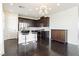 Modern kitchenette featuring stainless steel appliances and a breakfast bar at 1185 Via Dimartini, Henderson, NV 89052