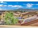 View of the neighborhood showcasing solar panels on nearby rooftops at 1185 Via Dimartini, Henderson, NV 89052