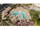 Aerial view of the community pool showcasing the lounge chairs, umbrellas and covered area at 1185 Via Dimartini, Henderson, NV 89052