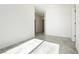 Bright room with neutral walls, tile floors, and recessed lighting offers a versatile living space at 1185 Via Dimartini, Henderson, NV 89052